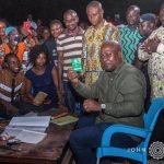 Former president John Mahama showing his NDC card