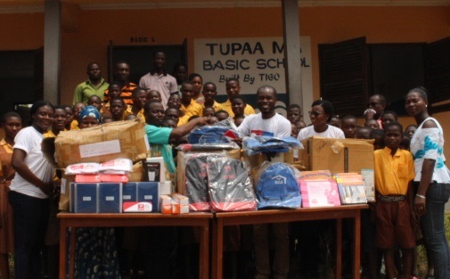 Father Joseph receiving the donation on behalf of Tupa MA Basic School