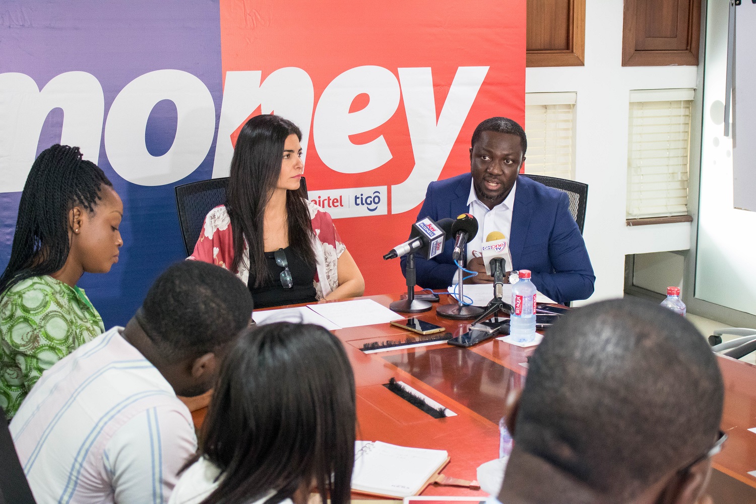 CEO AirtelTigo, Roshi Motman and Director of AirtelTigo Money, Edmund Barwuah Briefing the media on AirtelTigo Money
