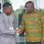 Bawumia and Peter Amewu in a handshake
