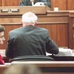 The brothers confer during their 1995 trial