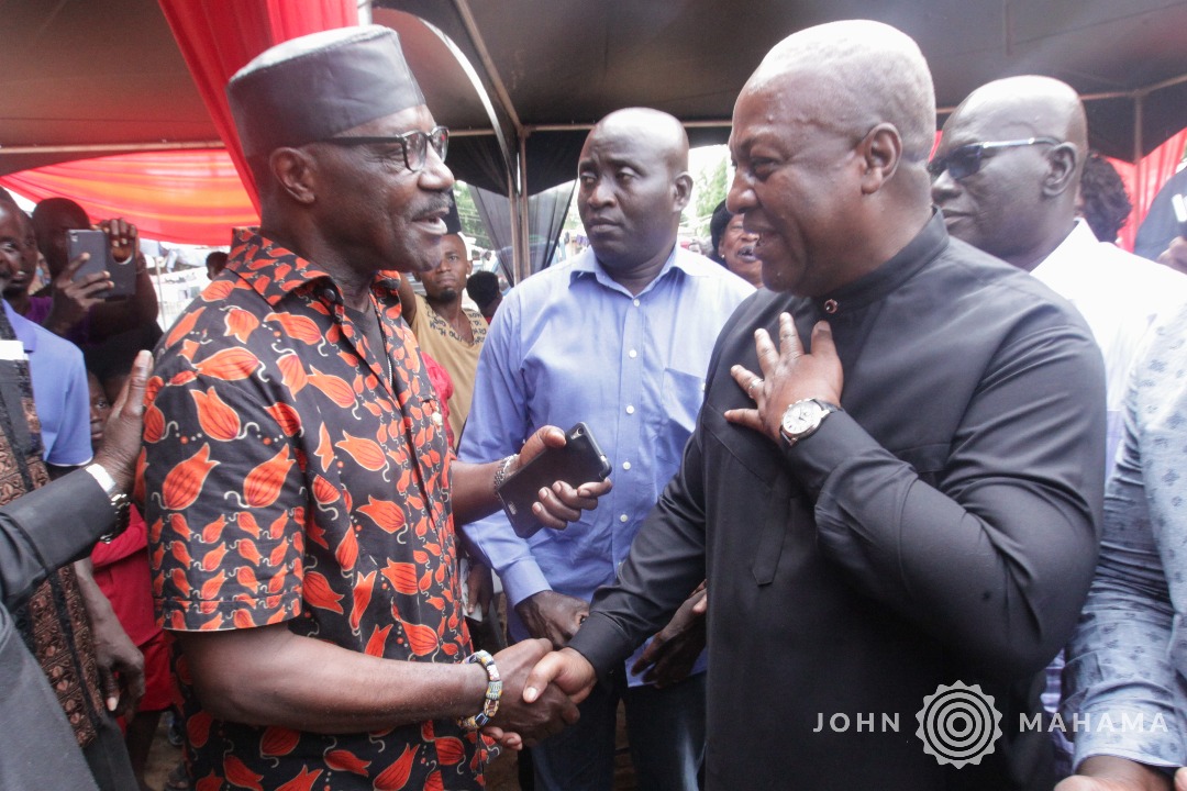 Fmr president John Mahama chatting with Blay Ambulley at the one week celebration