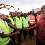 President Akufo-Addo exchanging pleasantries with workers at the site