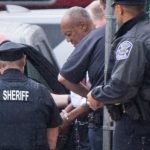 After the sentencing, Cosby (centre) was taken to Montgomery County Correctional Facility