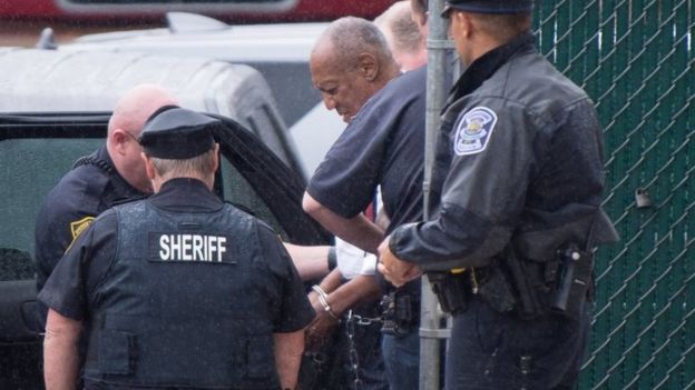 After the sentencing, Cosby (centre) was taken to Montgomery County Correctional Facility