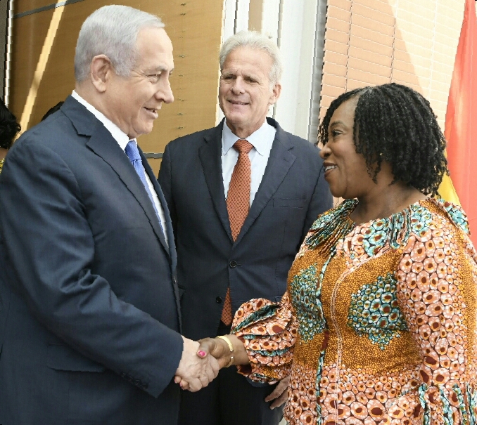 Israeli Prime Minister Benjamin Netanyahu and Mrs Botchwey conferring