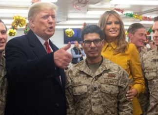 President Trump and his wife met military personnel at the al-Asad airbase, west of Baghdad