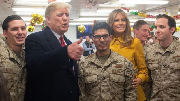President Trump and his wife met military personnel at the al-Asad airbase, west of Baghdad
