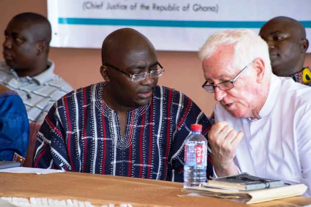 Father Campbell conferring with Dr Mahamudu Bawumia