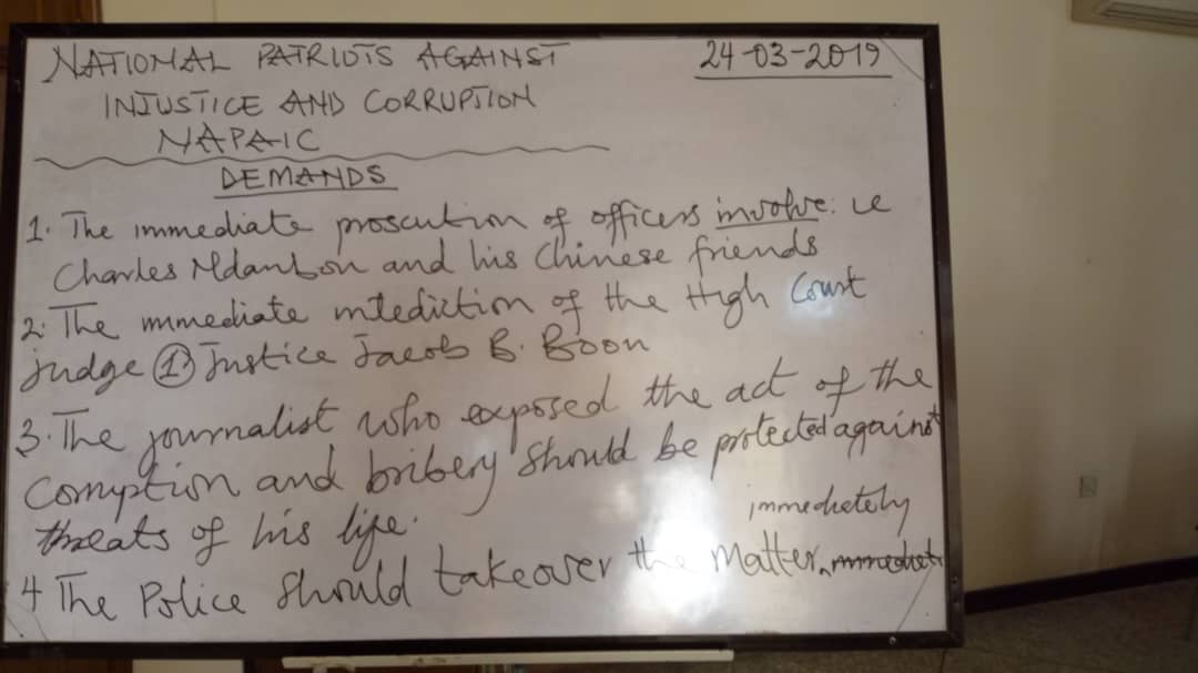 A board surfaced at the conference, highlighting NAPAIC's request for protection of Starr News' correspondent, Edward Adeti, among other demands.