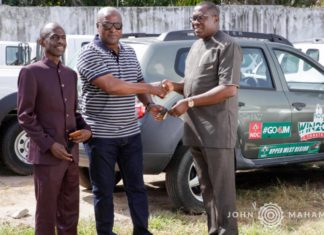 Mr. John Mahama presenting the vehicles to the leadership of the party