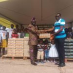 Mr. Tetteh presenting the items to the Tema SOS Village