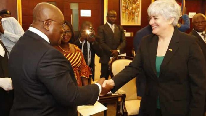 US Ambassador to Ghana, Stephanie Sullivan in a handshake with president Akufo-Addo