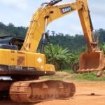 Seized excavator and trucks during National Security anti-galamsey operation in Ankaase