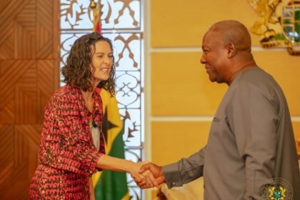 President Mahama and UK High Commissioner Harriet Thompson in farewell handshake
