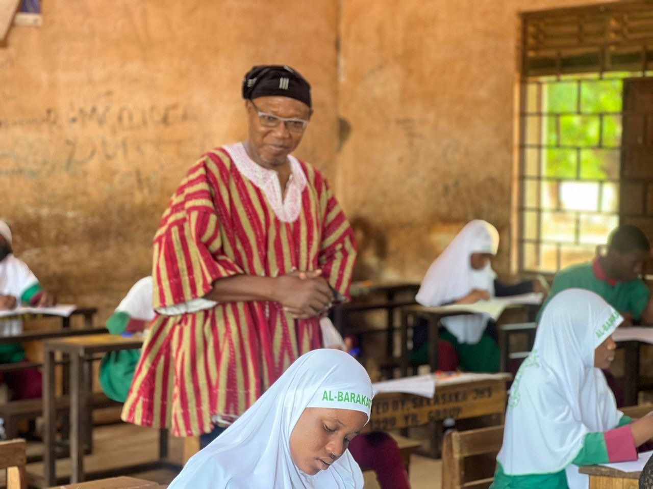 Dr. Clement Apaak addressing BECE candidates at Tamale Secondary School.