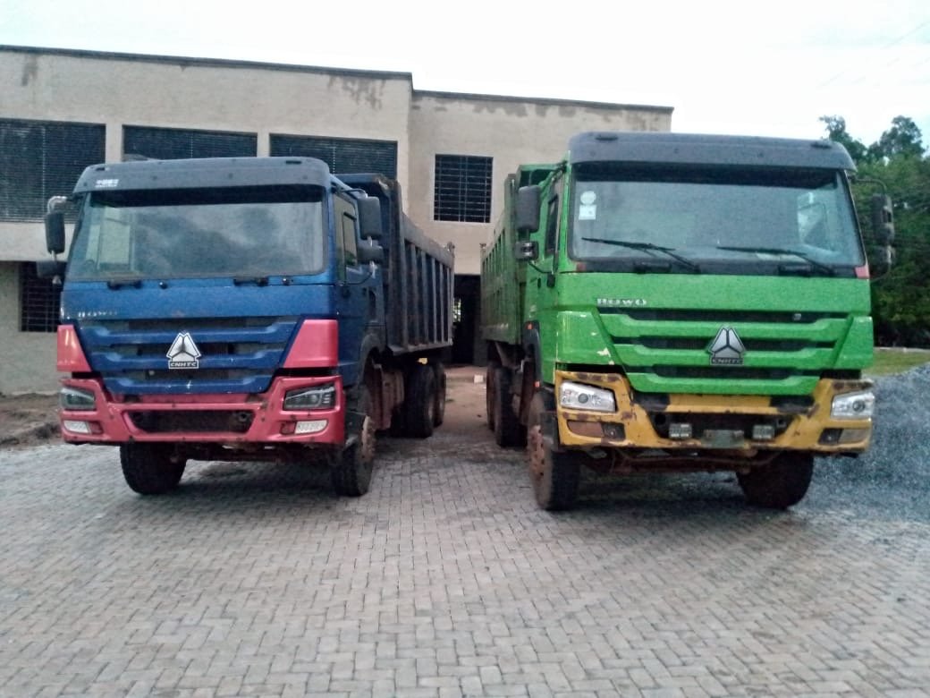 Tipper trucks intercepted with sacks of marijuana hidden under sand