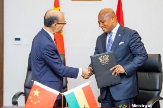 Foreign Minister Okudzeto Ablakwa and Chinese Ambassador Tong Defa sign $30 million grant agreement for Aflao market